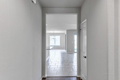 Entry hall/foyer has beautiful faux wood floors and is extra wide for decorating to welcome your guests.  You will notice all exterior and interior doors are extra wide for maximum accessibility.
.