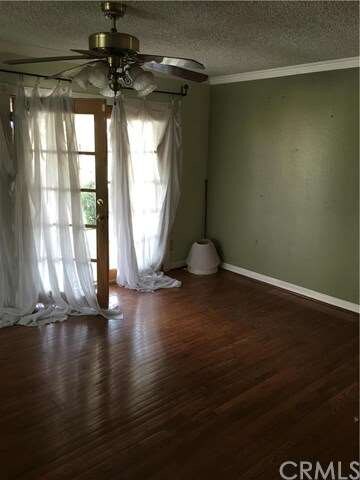 Dining room with hardwood floors.
