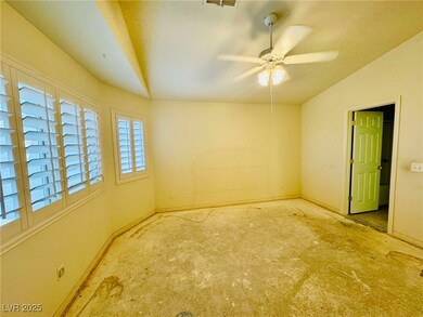 Unfurnished room with visible vents, ceiling fan,