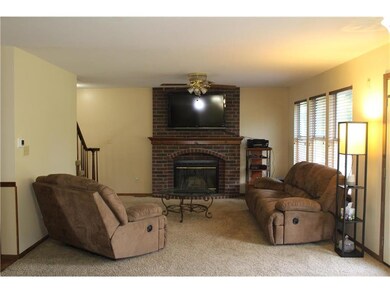 Family room with fireplace and lots of light, Open