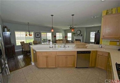 FROM THE KITCHEN INTO THE SPACIOUS FAMILY ROOM!