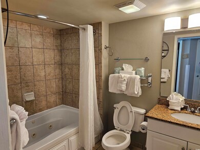 Full bathroom featuring shower / bathtub combinati