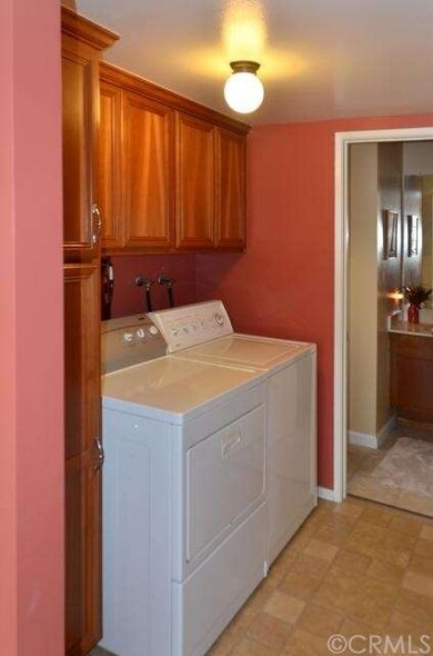 Laundry off kitchen with nice built ins!