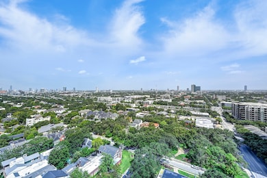 The unit offers spectacular 270 degree views of the Med Center, Herman Park, downtown and The Galleria.