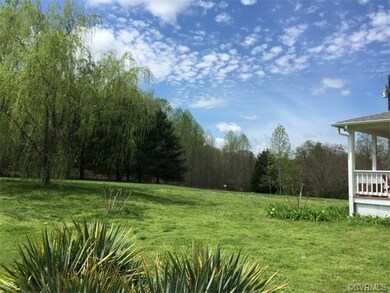 Great size front yard with trees lining the cul-de