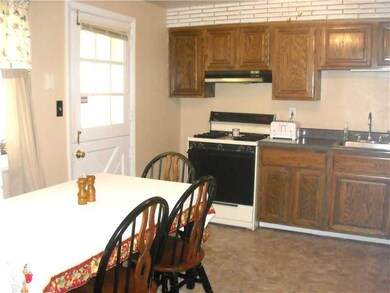 Kitchen. Kitchen with back door that also leads to