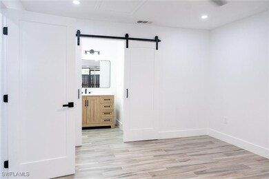 Unfurnished bedroom featuring light wood finished