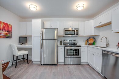 Kitchen with appliances with stainless steel finis