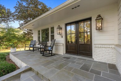 Entrance to property with a porch
