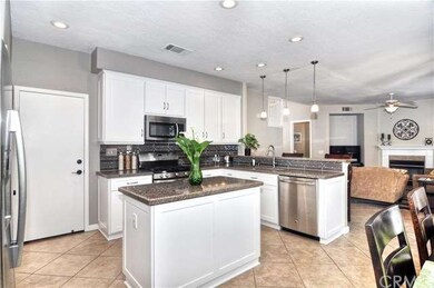 Newer kitchen with stainless steel range/oven, mic