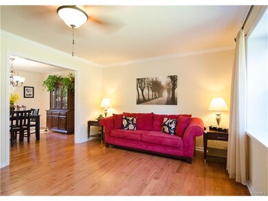 The living room is beautifully open to the dining 