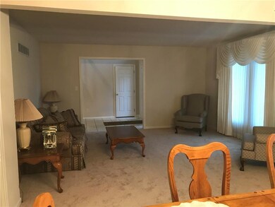 View from dining area back to entry.