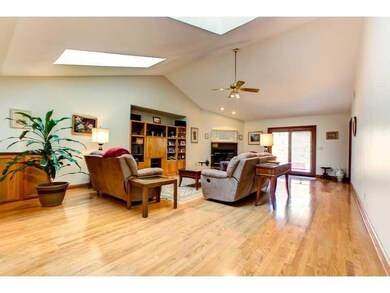 Living Room. Patio doors lead to double tiered woo