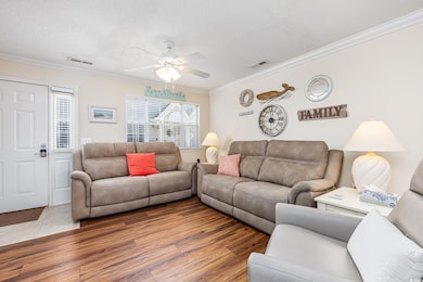 Living area featuring a wealth of natural light, v