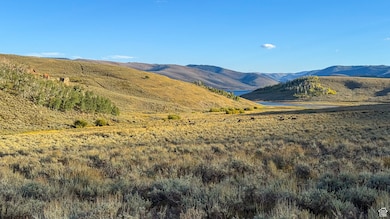 Mountain view featuring a large body of water