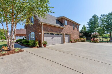 Highly desired 3 car garage with a massive extended concrete driveway for added parking