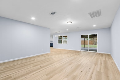The Family Room is huge! There is a new vinyl slid