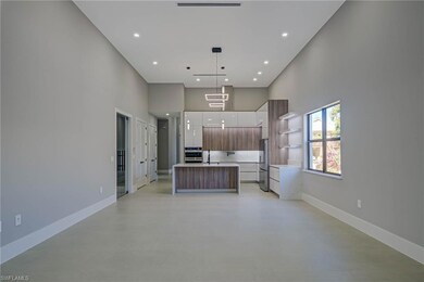 Kitchen featuring sink, hanging light fixtures, a 
