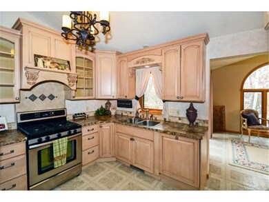 Vaulted ceilings, tiled backsplash and gorgeous a 