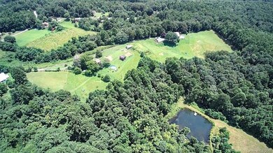 See pond with dock in lower right quadrant