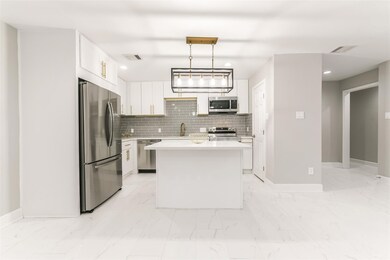 Kitchen also has easy access to garage