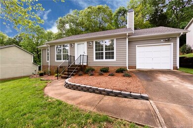 Thoughtful landscaping touches frame the front of the house!