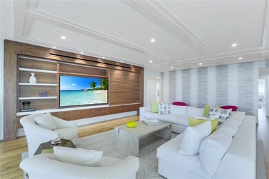 Living room featuring wood finished floors and recessed lighting