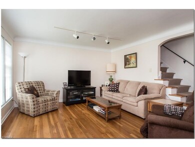 Spacious Living Room with Gleaming Hardwood Floors