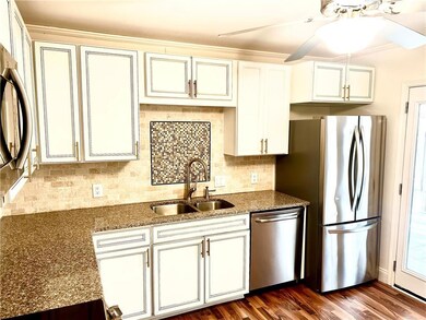 Kitchen featuring appliances with stainless steel 