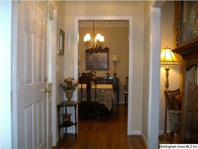 The foyer has hardwood flooring and gives a great 