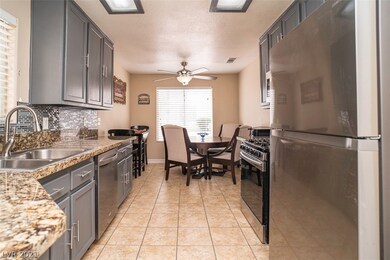 Kitchen & dining area with ceiling fan