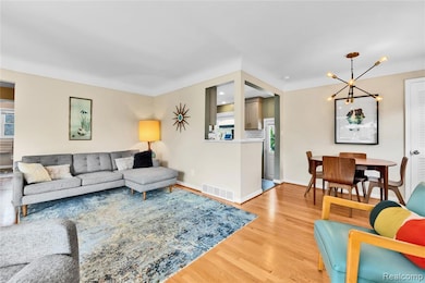 living room to dining area and kitchen