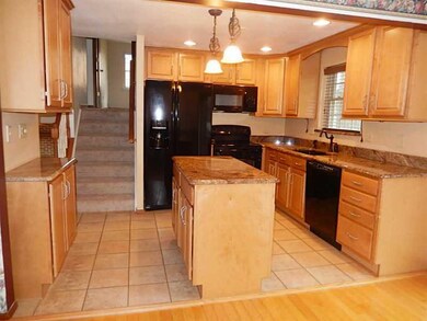 Kitchen. Island for meal prep and also a good spot
