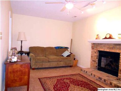 Den with fireplace
