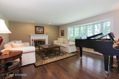 Spacious Living  room featuring wall of windows fo