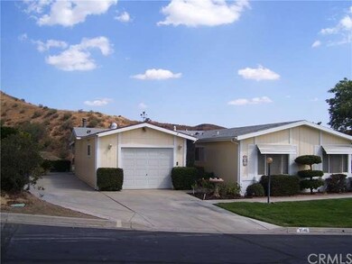 RV parking on the left side of garage