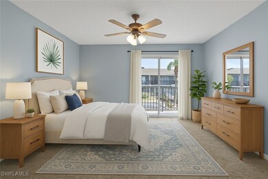 Bedroom with access to exterior, a ceiling fan, an