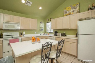 Sunny Island Kitchen w/ Cabinets Galore