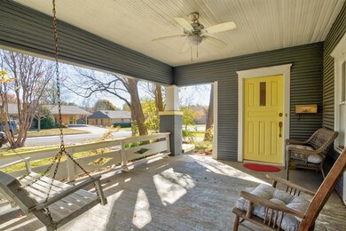 Lovely porch with a swing and room for more guests