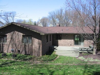 EXTERIOR BACK VIEW - LARGE DECK WITH ACCESS FROM F
