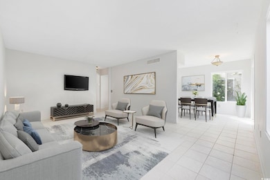 Living room with light tile flooring