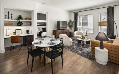 Dining area with hardwood / wood-style flooring