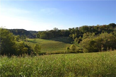 From the front lawn cherish the unobstructed, rich natural setting and views of the surrounding hills where you can see a variety of wildlife....deer, turkey, birds,...