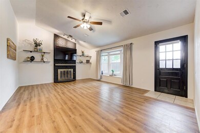 The half-pitched ceiling, floating shelves and dar