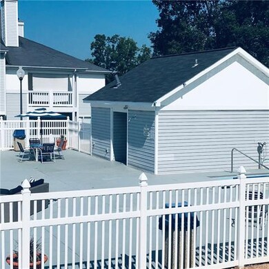 Pool area with shower and restrooms.