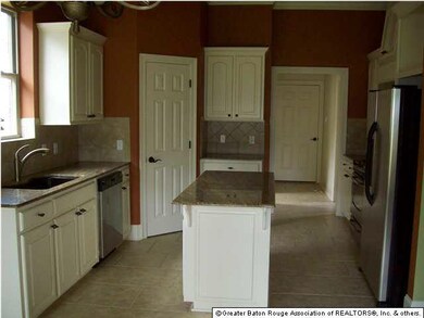 huge kitchen with gorgeous granite