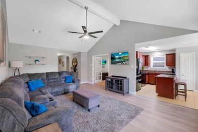 Living area is open to the flex room and the kitch