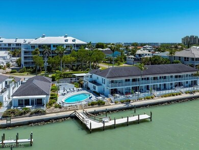 Aerial view with a residential view and a water vi