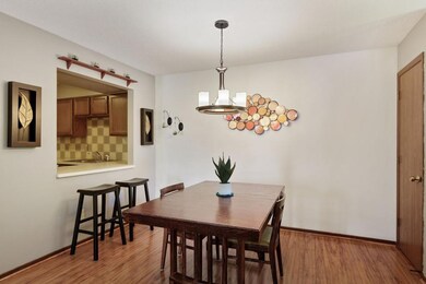 Dining Room opens to the Kitchen. Grab a stool for