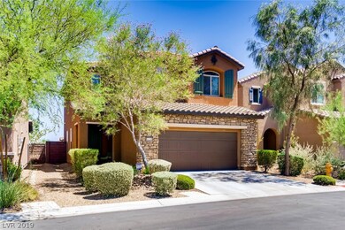 Covered entry and mature landscaping